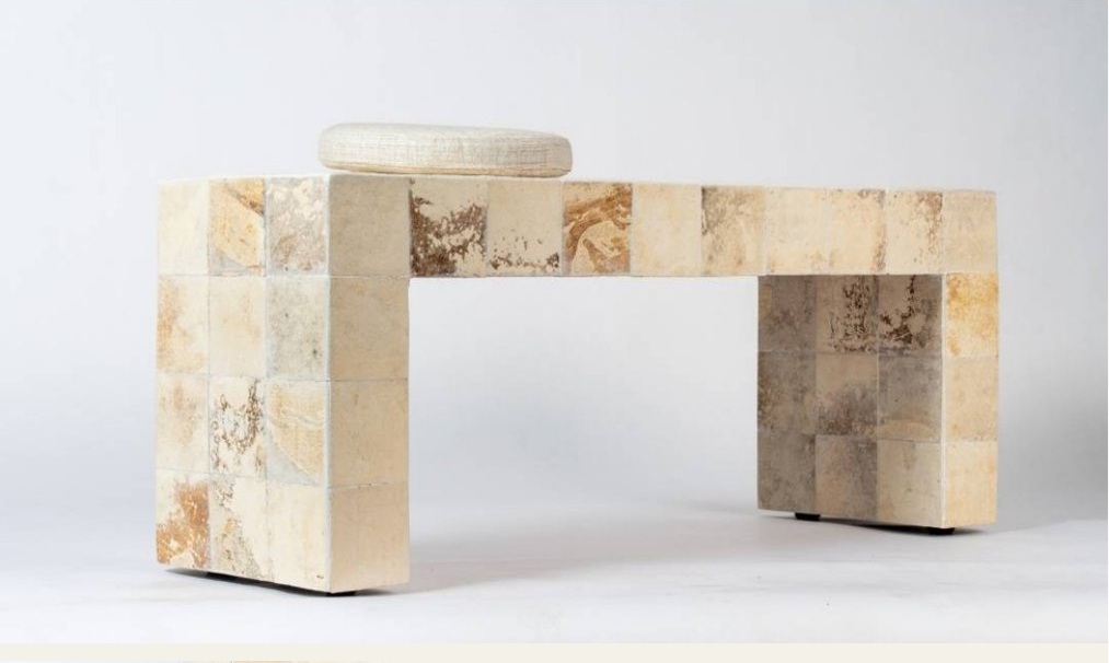 MUSH bench study clad in ivory and amber patterned material, with a pale cushion